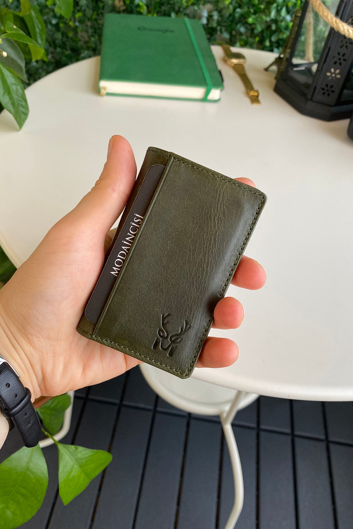 Orsa Genuine Leather Premium Credit Card Holder in various colors, showcasing its sleek design and card slots.