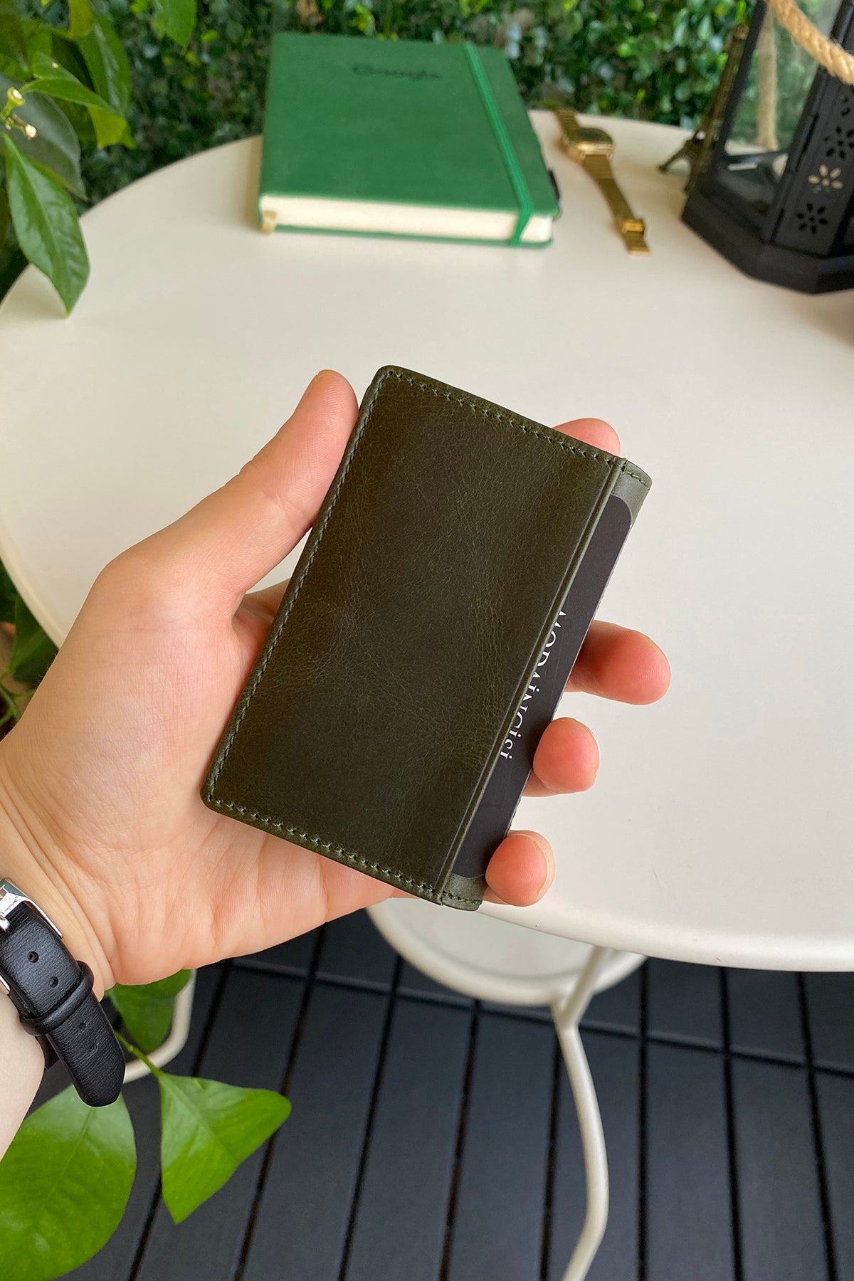 Orsa Genuine Leather Premium Credit Card Holder in various colors, showcasing its sleek design and card slots.