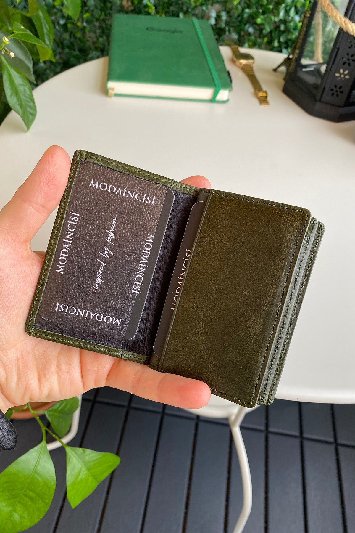 Orsa Genuine Leather Premium Credit Card Holder in various colors, showcasing its sleek design and card slots.