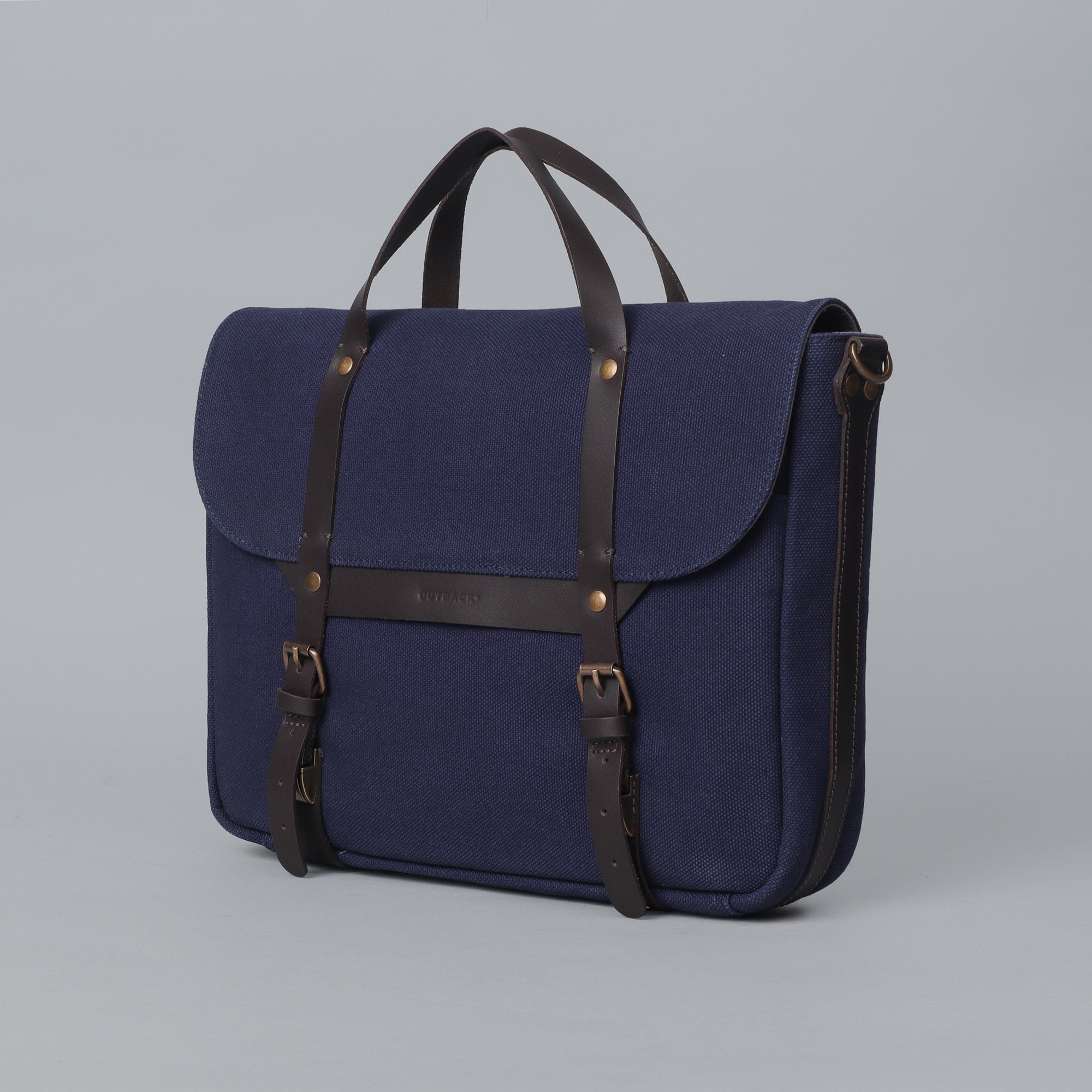 Oslo Canvas Briefcase showcasing its durable cotton canvas, leather straps, and multiple pockets for organization.