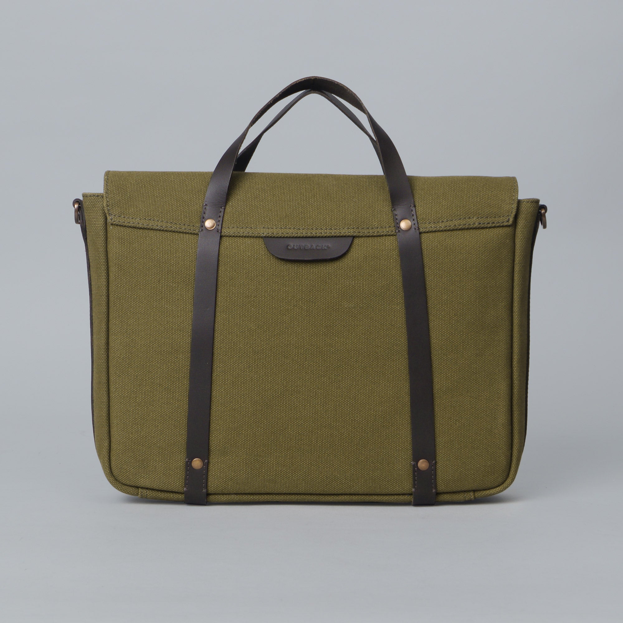 Oslo Canvas Briefcase made from durable cotton canvas, featuring leather straps and multiple pockets for organization, suitable for laptops up to 13 inches.