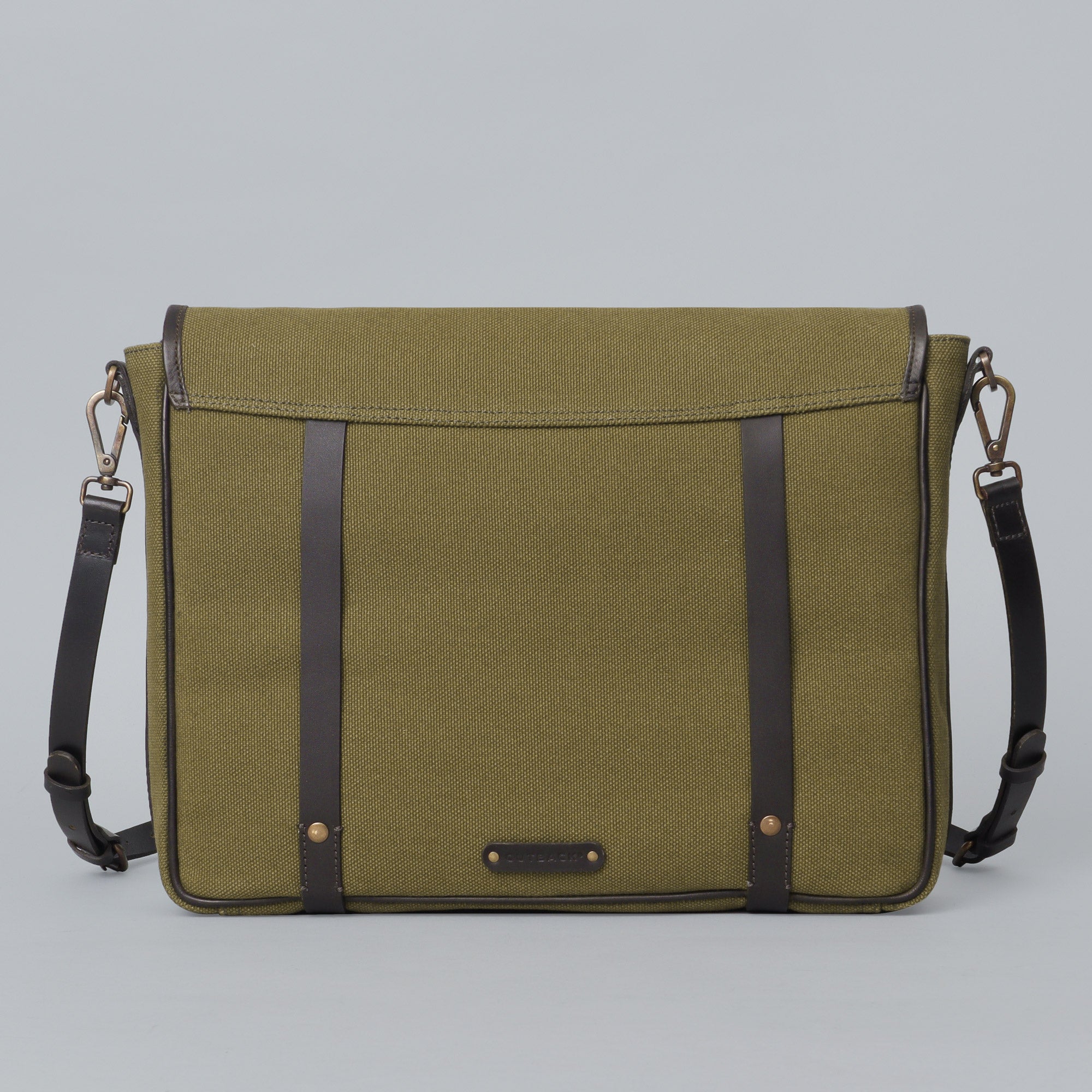 Oslo Canvas Messenger Bag featuring a durable design, leather strap, and multiple compartments for organization.