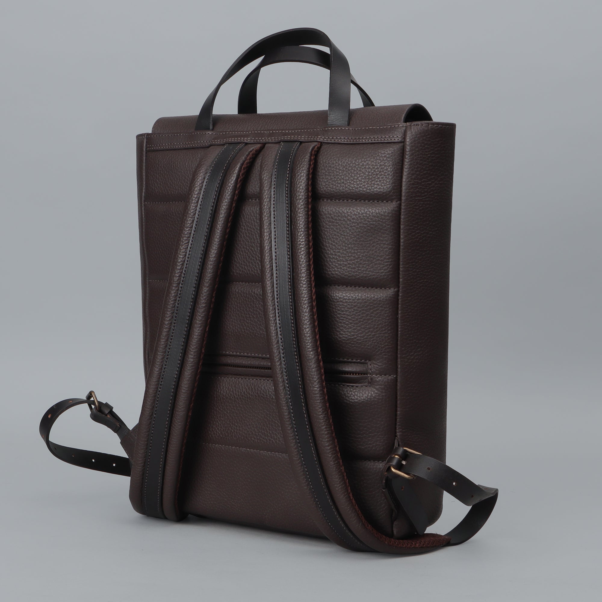 Oslo Leather Backpack made from premium full grain leather, featuring multiple pockets and adjustable straps, perfect for daily use and travel.