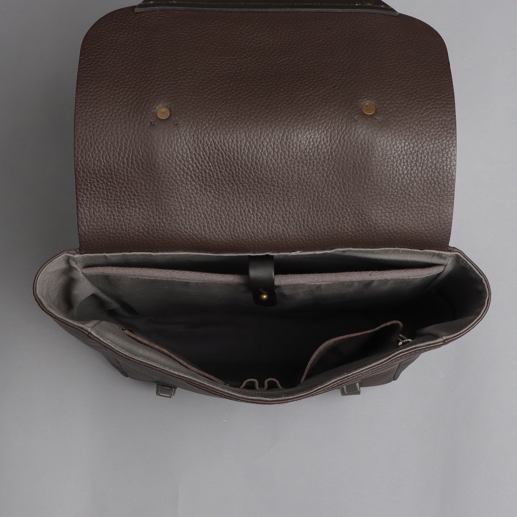 Oslo Leather Backpack made from premium full grain leather, featuring multiple pockets and adjustable straps, perfect for daily use and travel.