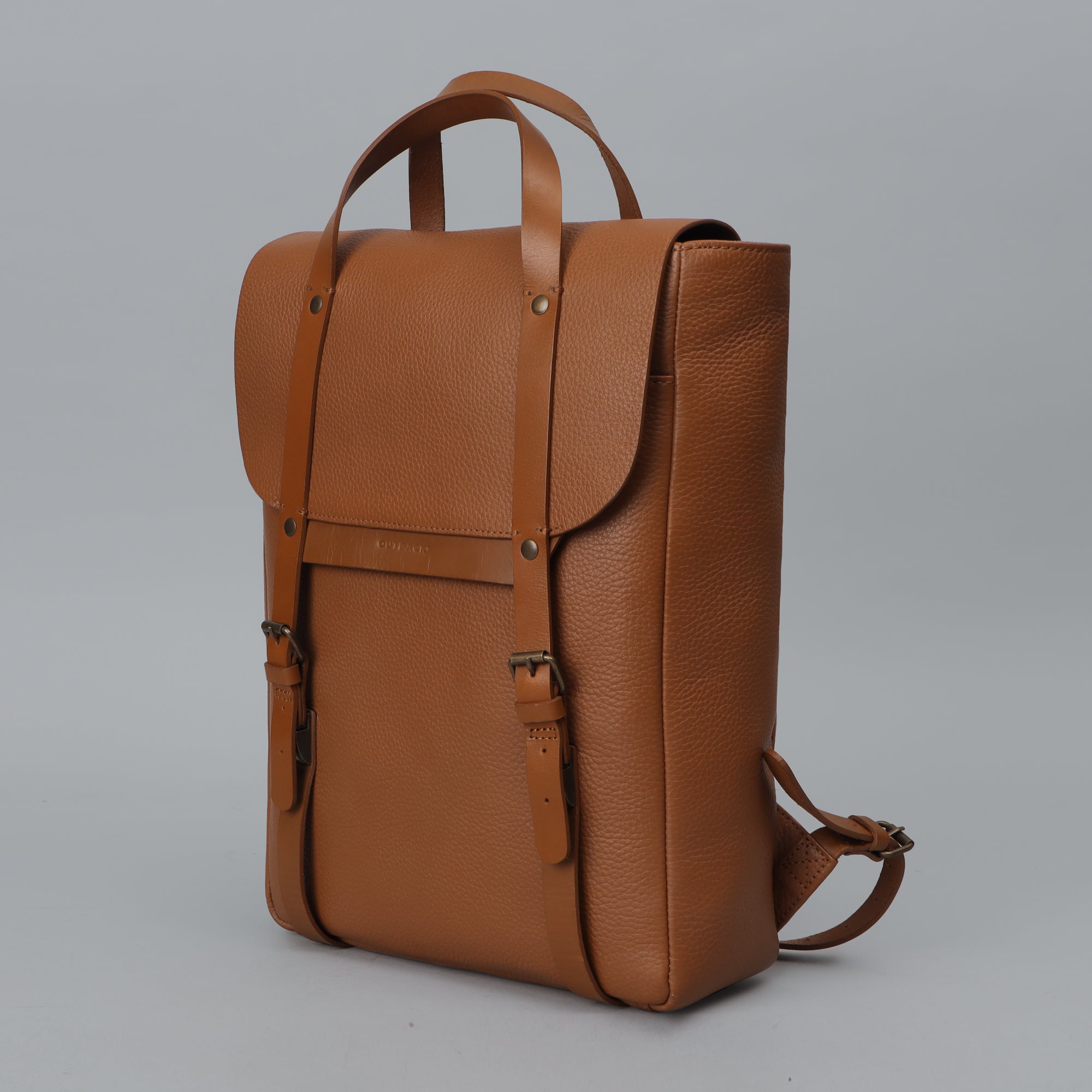 Oslo Leather Backpack made from premium full grain leather, featuring multiple pockets, adjustable straps, and a sleek design.