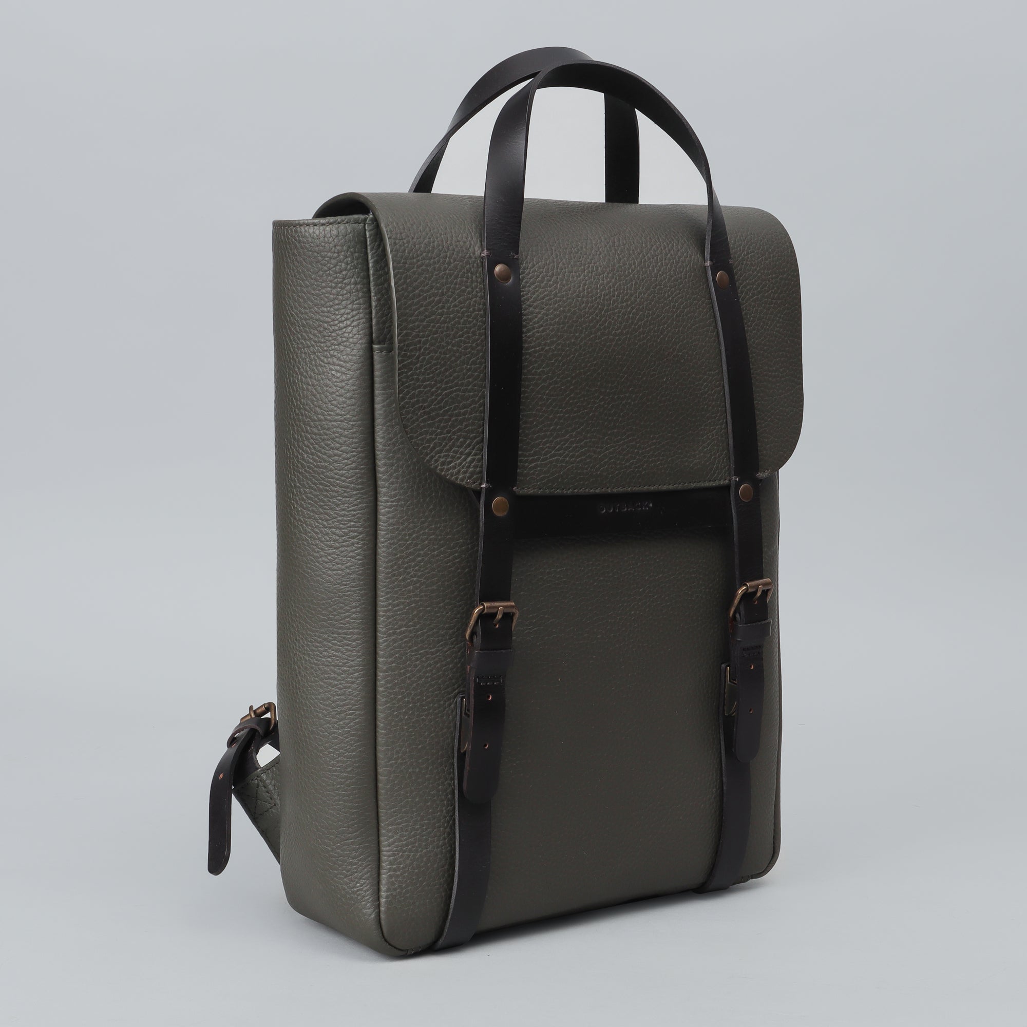 Oslo Leather Backpack made from premium full grain leather, featuring multiple pockets and adjustable straps, ideal for laptops and daily use.