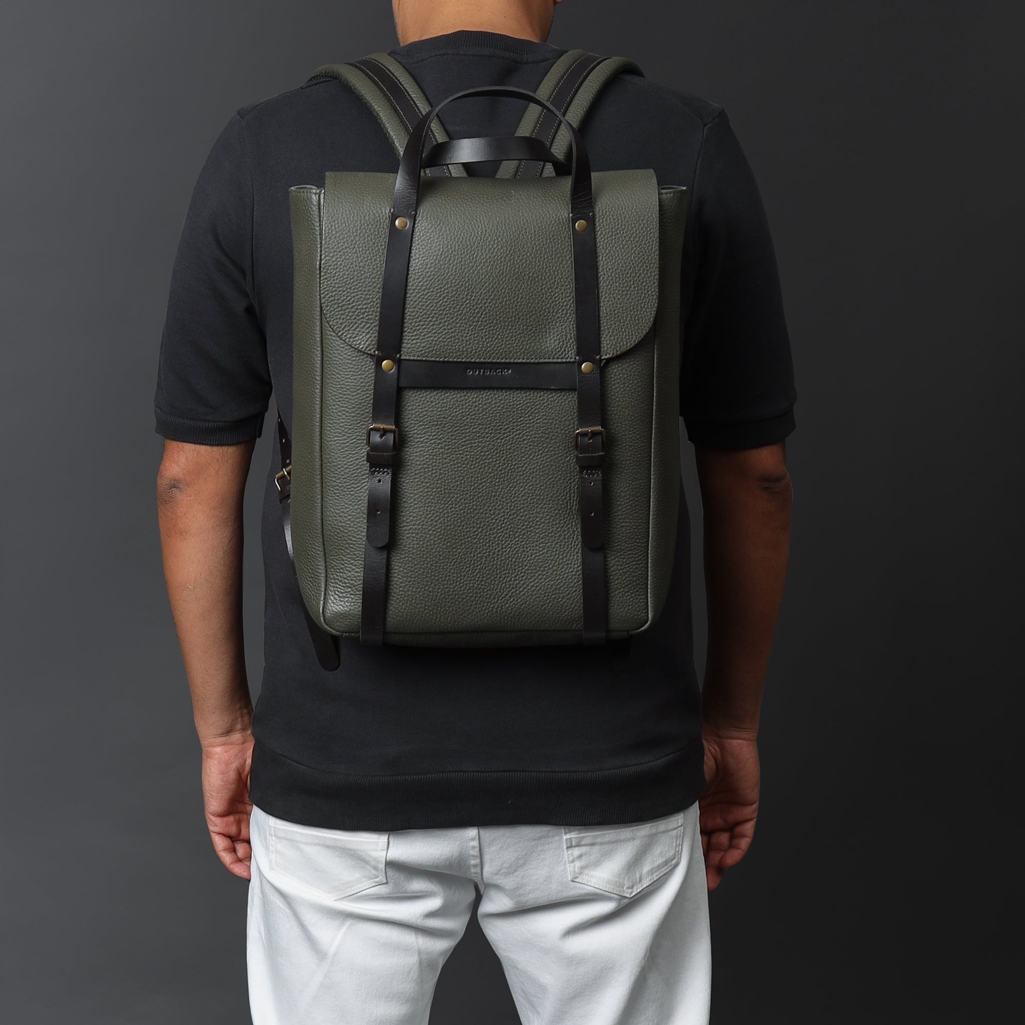 Oslo Leather Backpack made from premium full grain leather, featuring multiple pockets and adjustable straps, ideal for laptops and daily use.