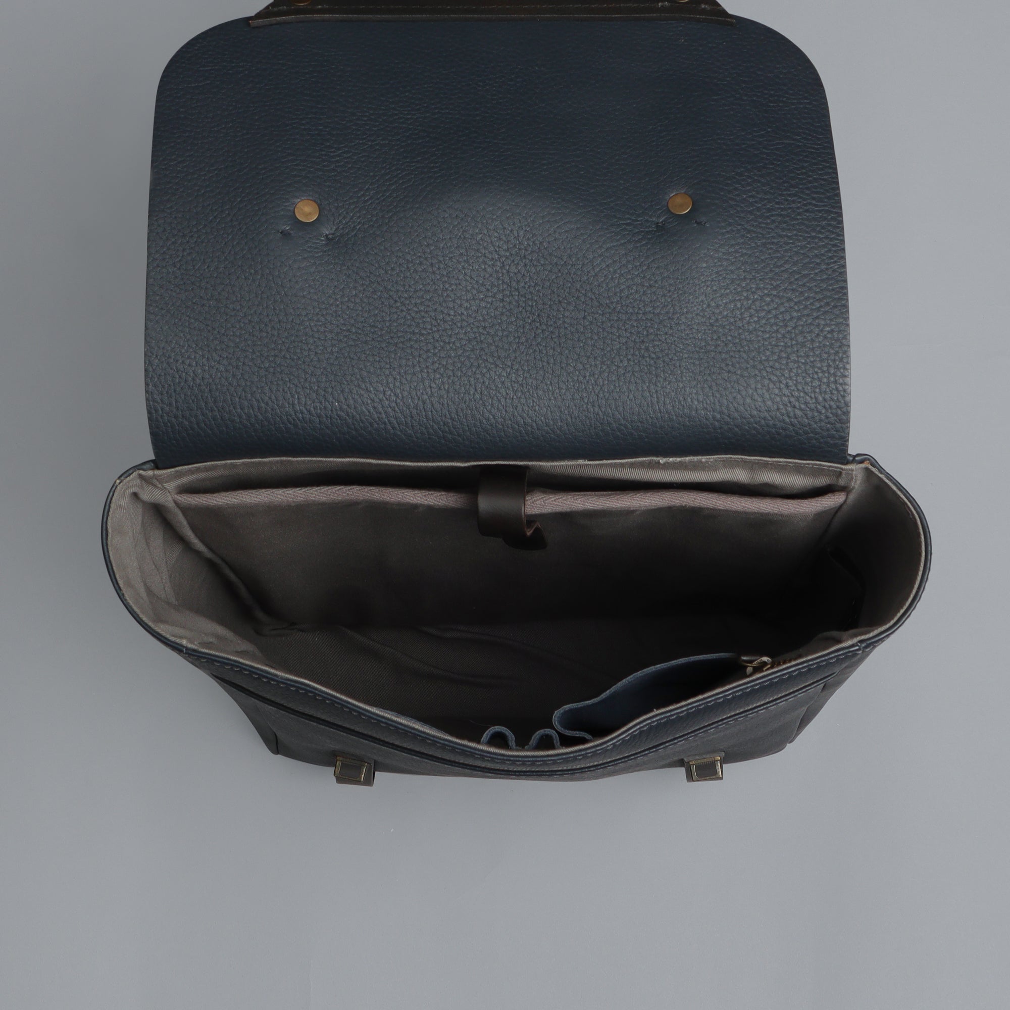 Oslo Leather Backpack made from premium full grain leather, featuring multiple pockets and adjustable straps, ideal for daily use.