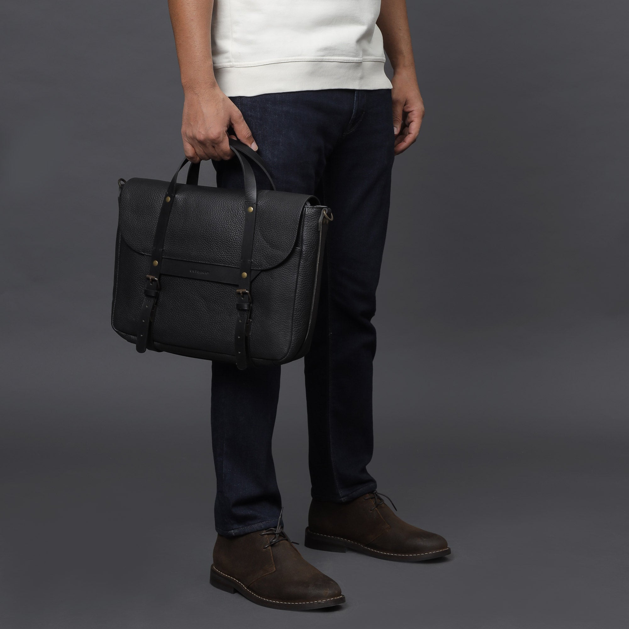 Oslo Leather Briefcase showcasing premium full grain leather, zipper pocket, and magnetic slip pocket for easy access.