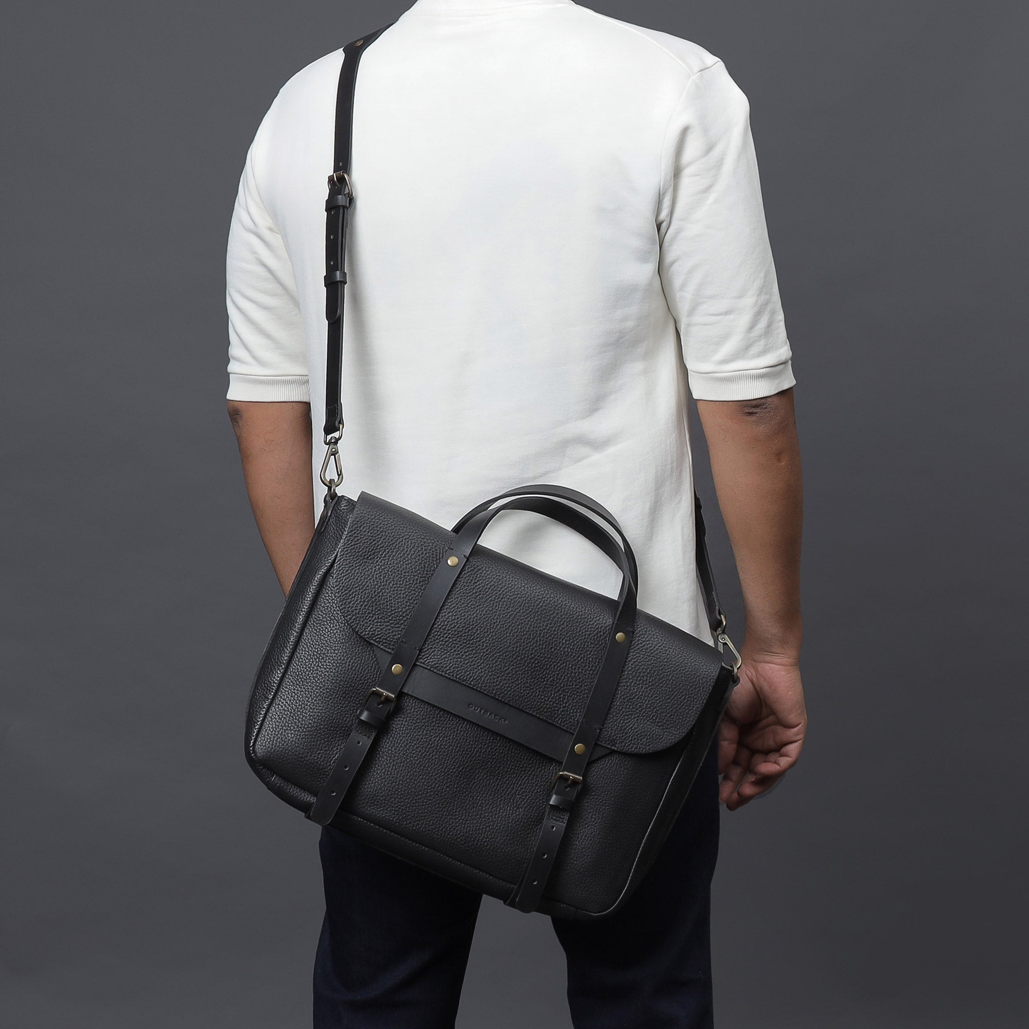 Oslo Leather Briefcase showcasing premium full grain leather, zipper pocket, and magnetic slip pocket for easy access.