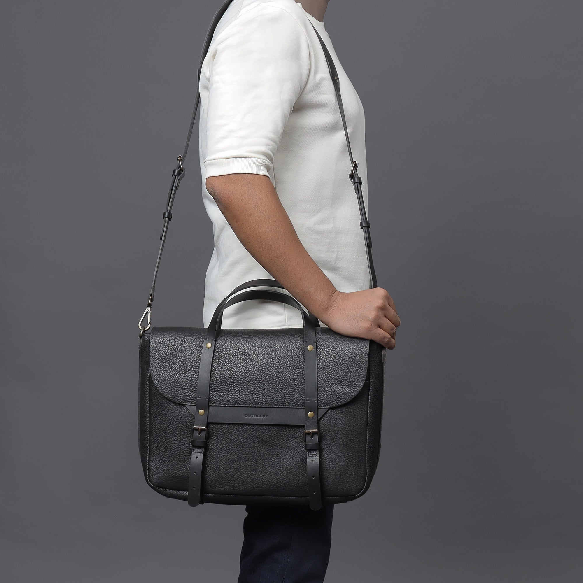 Oslo Leather Briefcase showcasing premium full grain leather, zipper pocket, and magnetic slip pocket for easy access.