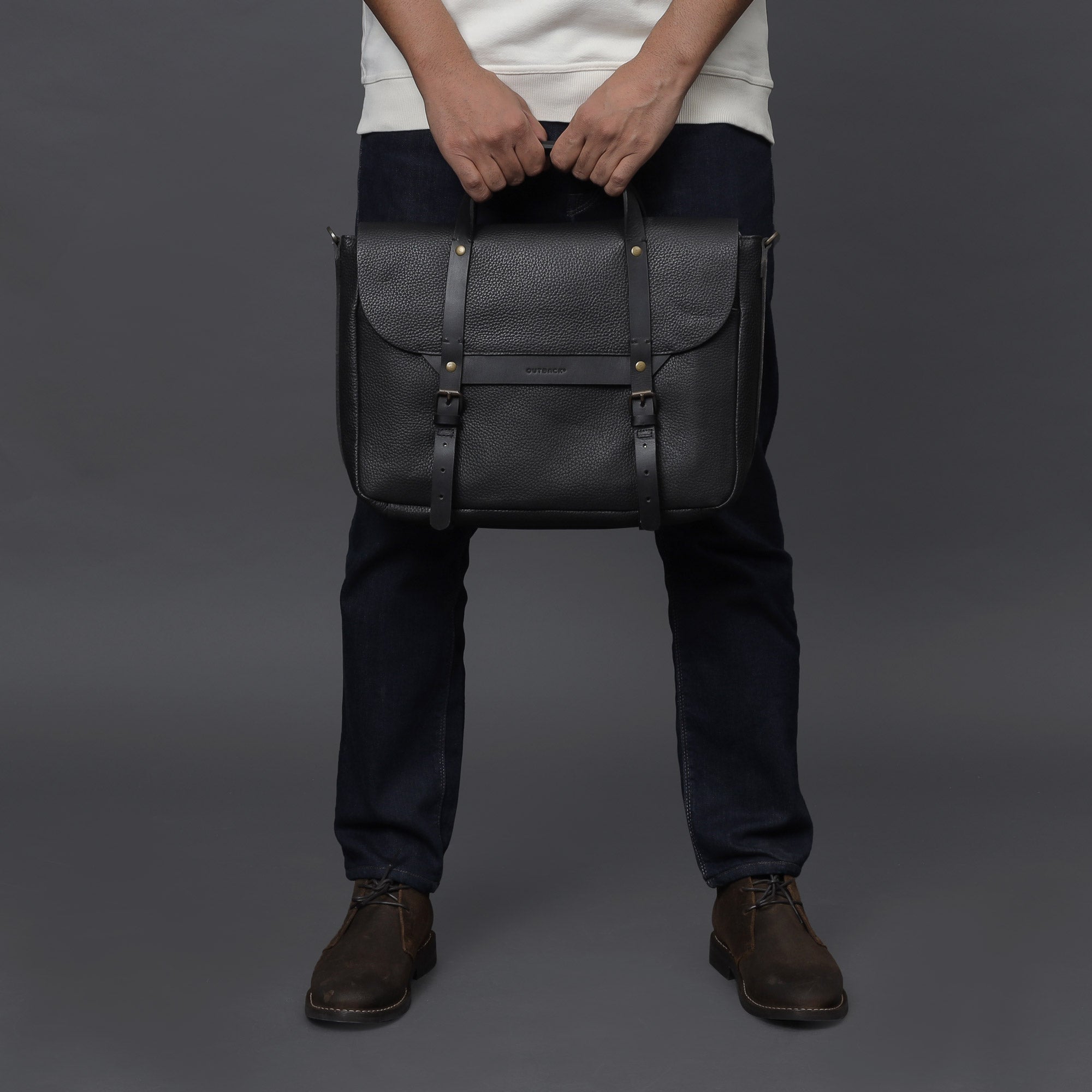 Oslo Leather Briefcase showcasing premium full grain leather, zipper pocket, and magnetic slip pocket for easy access.