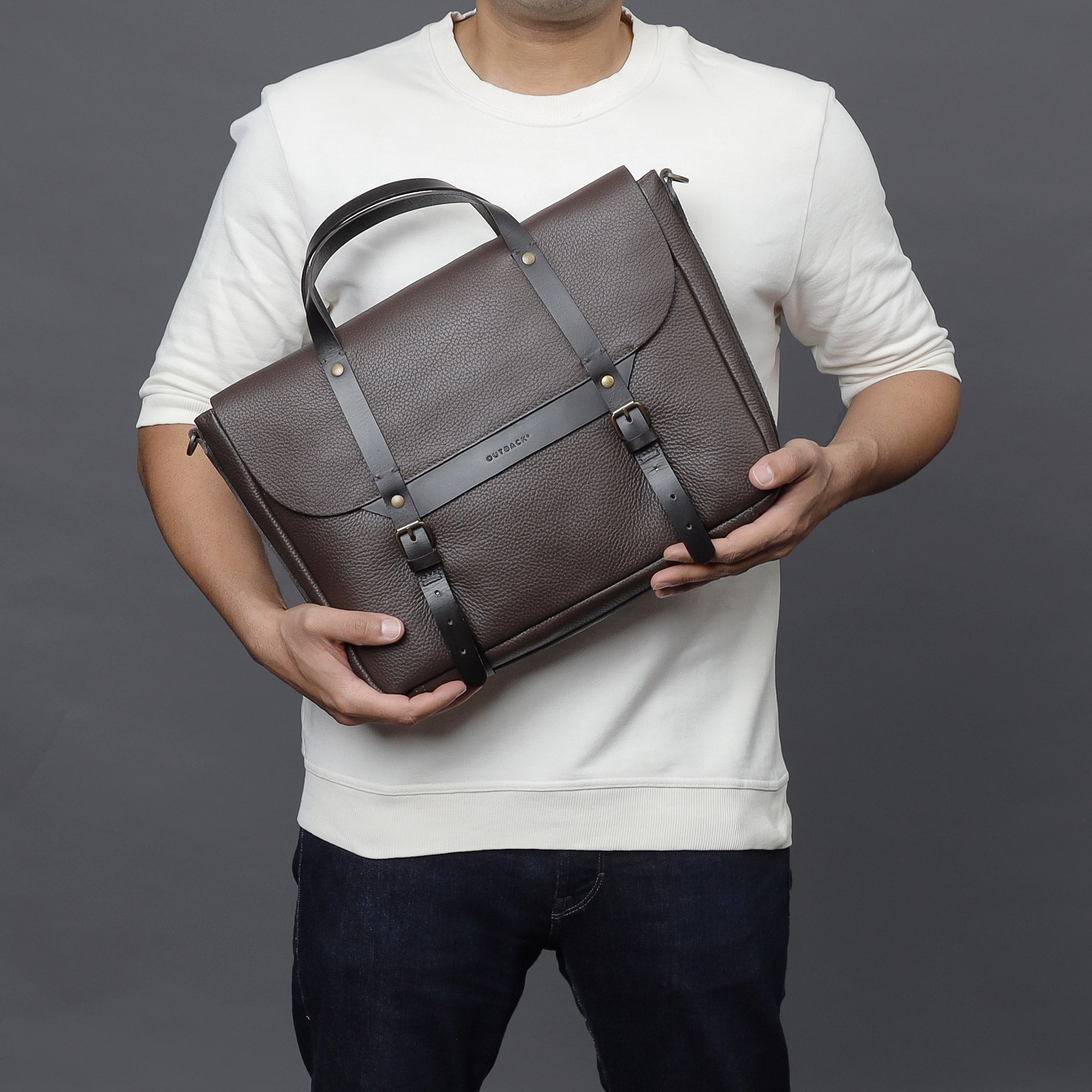 Oslo Leather Briefcase made from premium full grain leather, featuring a separate laptop section, zipper pocket, and magnetic slip pocket.