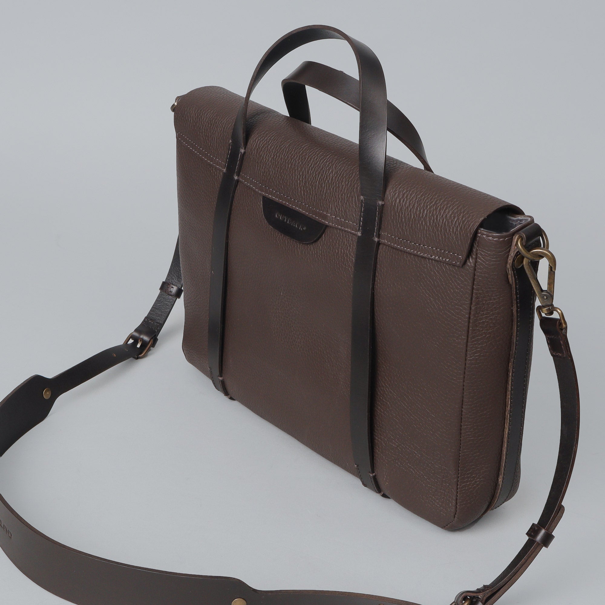 Oslo Leather Briefcase made from premium full grain leather, featuring a separate laptop section, zipper pocket, and magnetic slip pocket.