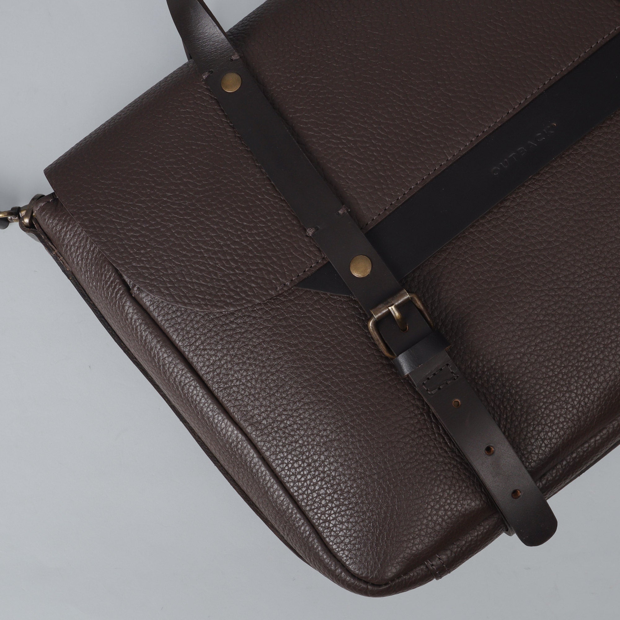 Oslo Leather Briefcase made from premium full grain leather, featuring a separate laptop section, zipper pocket, and magnetic slip pocket.