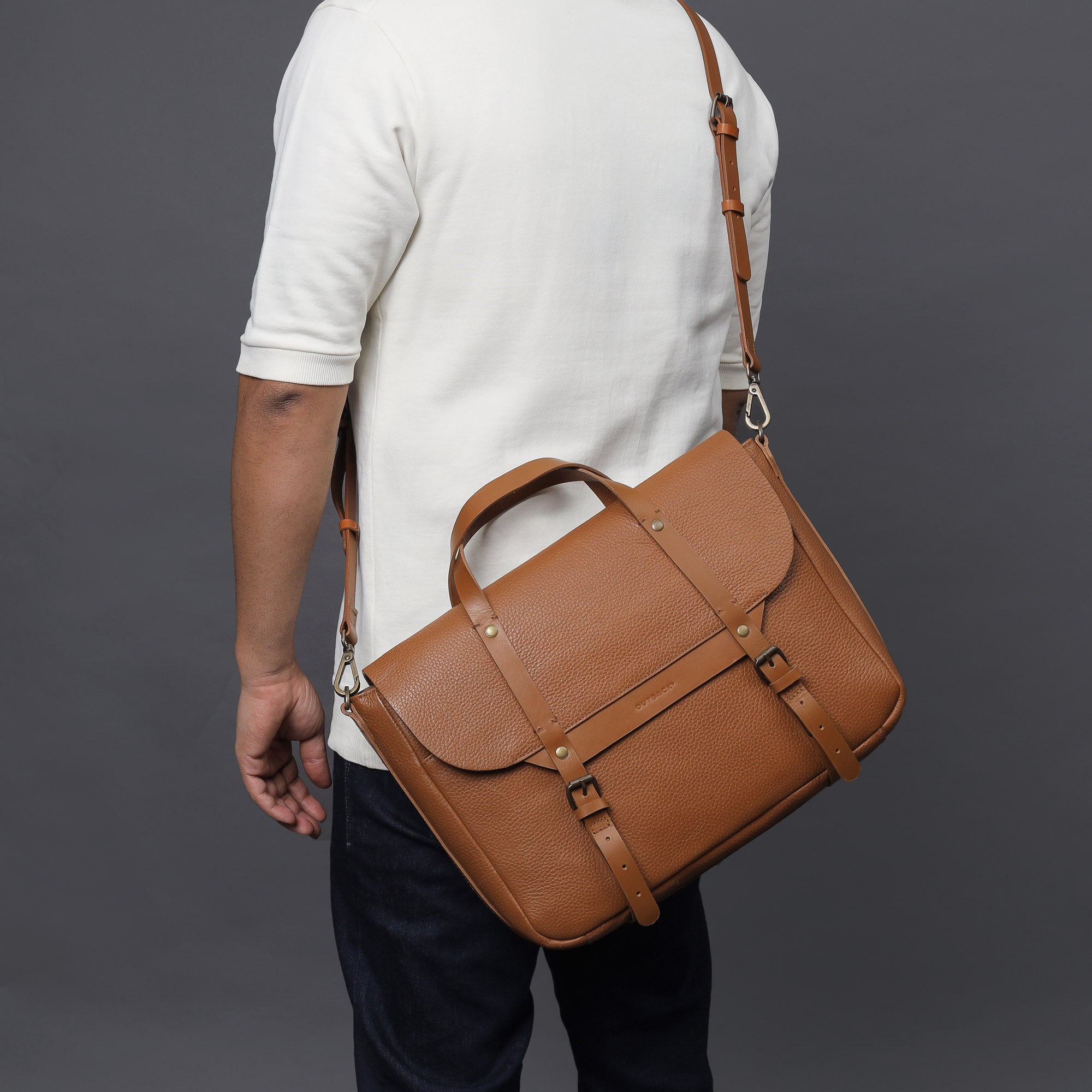 Oslo Leather Briefcase made from premium full grain leather, featuring a separate laptop section, zipper pocket, and magnetic slip pocket.