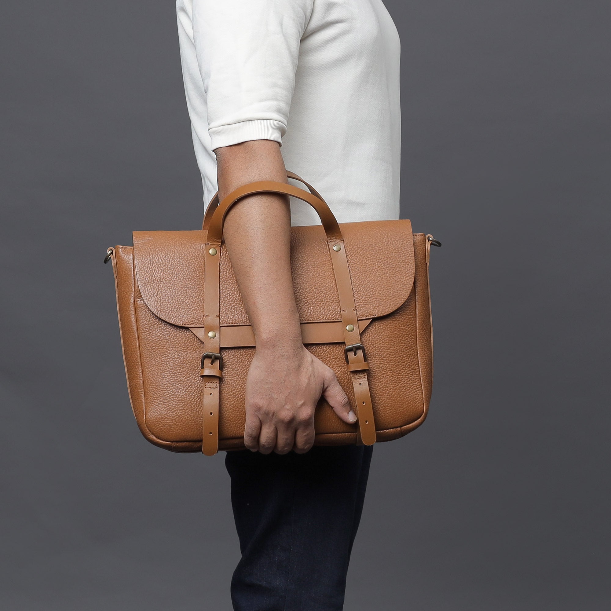 Oslo Leather Briefcase made from premium full grain leather, featuring a separate laptop section, zipper pocket, and magnetic slip pocket.