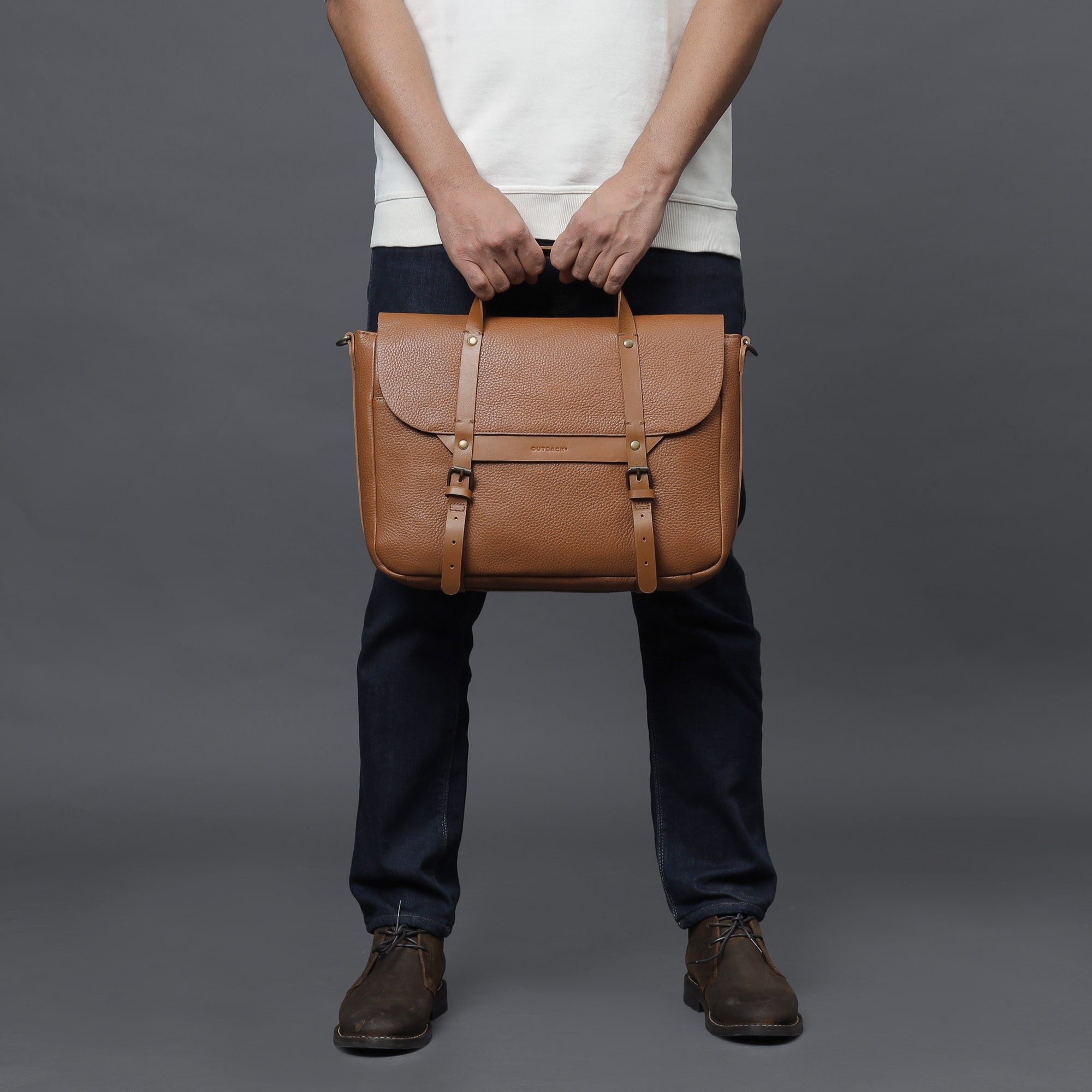 Oslo Leather Briefcase made from premium full grain leather, featuring a separate laptop section, zipper pocket, and magnetic slip pocket.