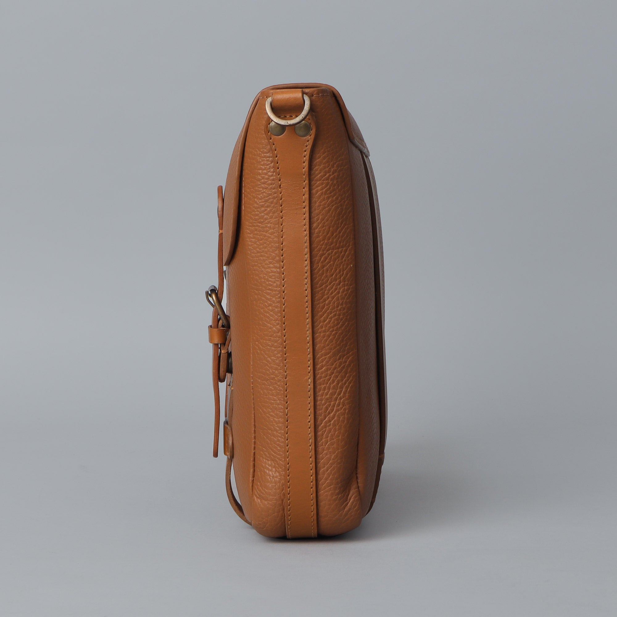 Oslo Leather Messenger Bag made from premium full grain leather, featuring a laptop compartment and stylish design.