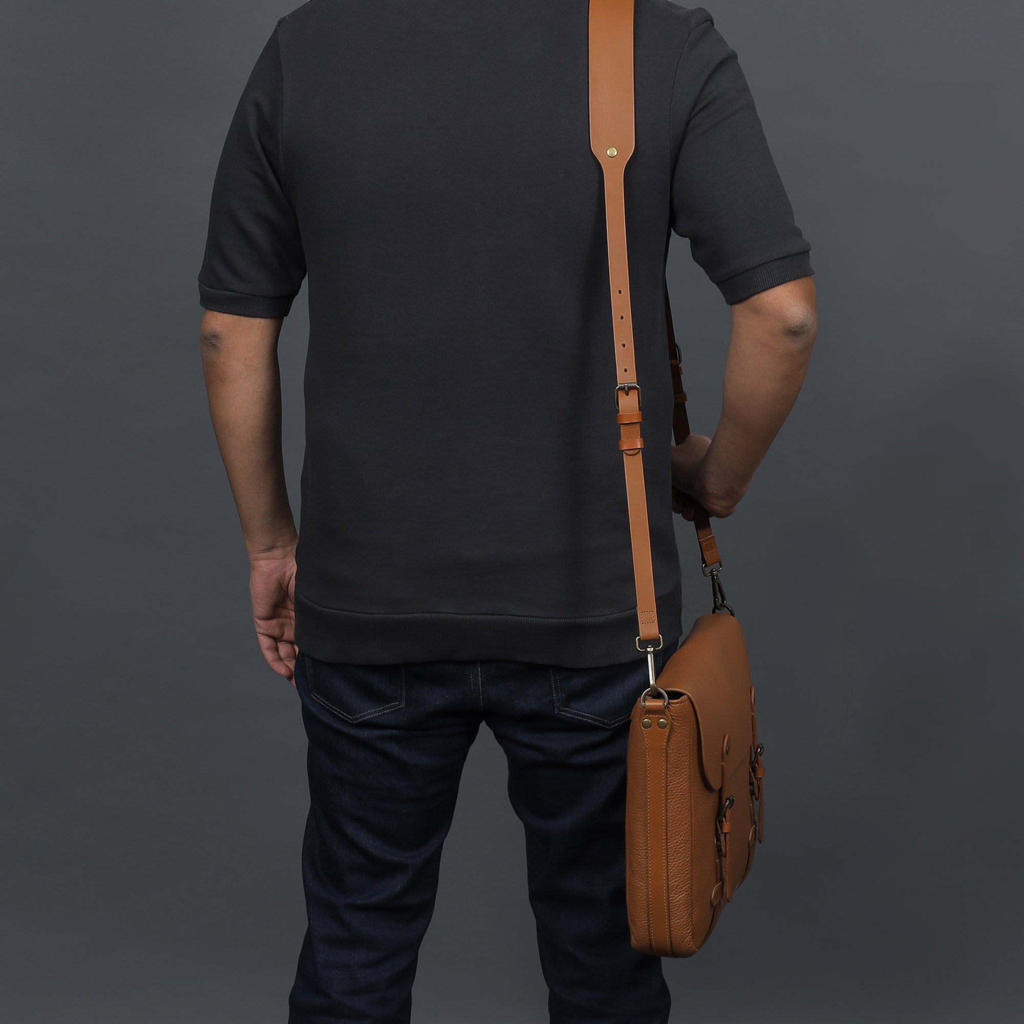 Oslo Leather Messenger Bag made from premium full grain leather, featuring a laptop compartment and stylish design.