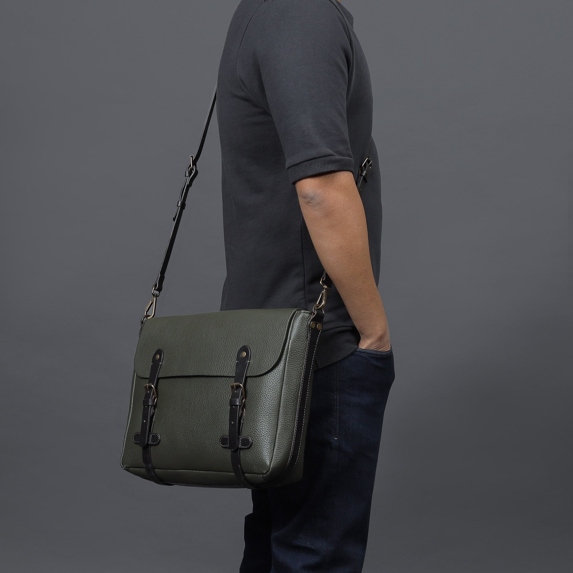 Oslo Leather Messenger Bag made from premium full grain leather, featuring a separate laptop compartment and multiple pockets for organization.