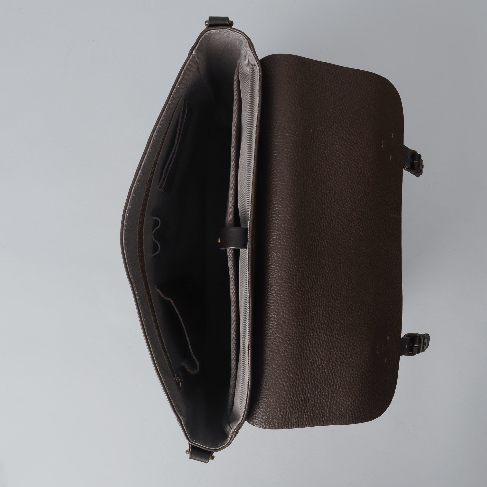 Oslo Leather Messenger Bag showcasing premium full grain leather, spacious compartments, and a comfortable shoulder strap.