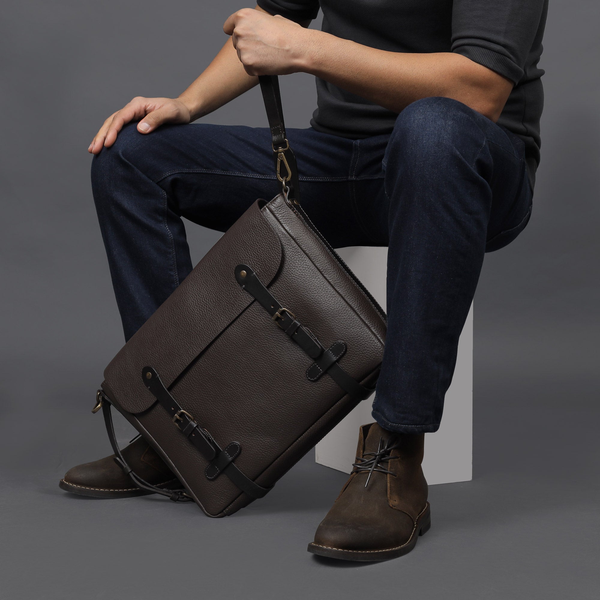 Oslo Leather Messenger Bag showcasing premium full grain leather, spacious compartments, and a comfortable shoulder strap.