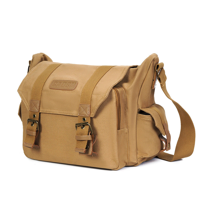 Outdoor Canvas Leisure One-shoulder Camera Bag with tripod straps and large capacity for lenses, designed for photographers.