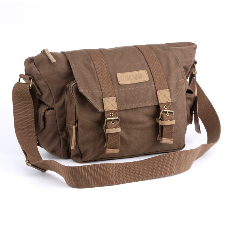 Outdoor Canvas Leisure One-shoulder Camera Bag with tripod straps and large capacity for lenses, designed for photographers.