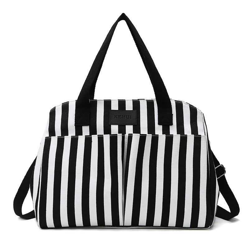 Stylish Oxford Cloth Striped Mommy Bag with soft handle and zipper closure, perfect for outings.