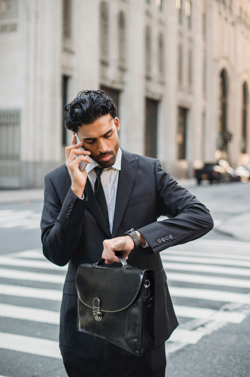 Oxford Extra Slim Double Compartment Business Briefcase in Tobacco, showcasing its sleek design and compartments for organization.