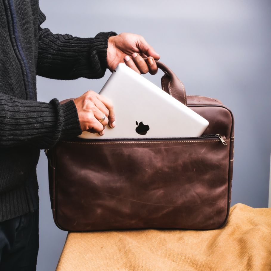 Oxford Pure Leather Vintage Business Laptop Bag in dark brown, showcasing its elegant design and multiple compartments.