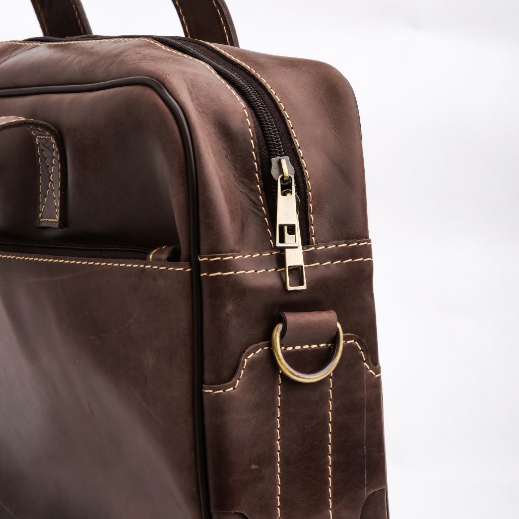 Oxford Pure Leather Vintage Business Laptop Bag in dark brown, showcasing its elegant design and multiple compartments.