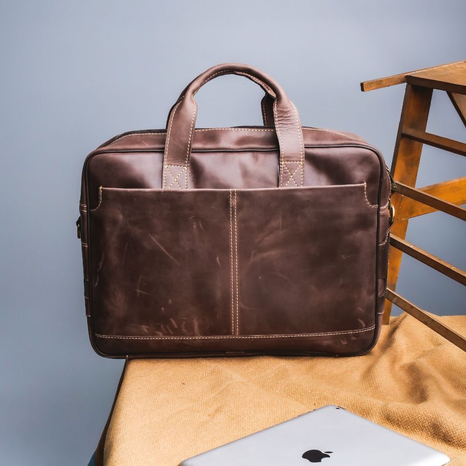 Oxford Pure Leather Vintage Business Laptop Bag in dark brown, showcasing its elegant design and multiple compartments.