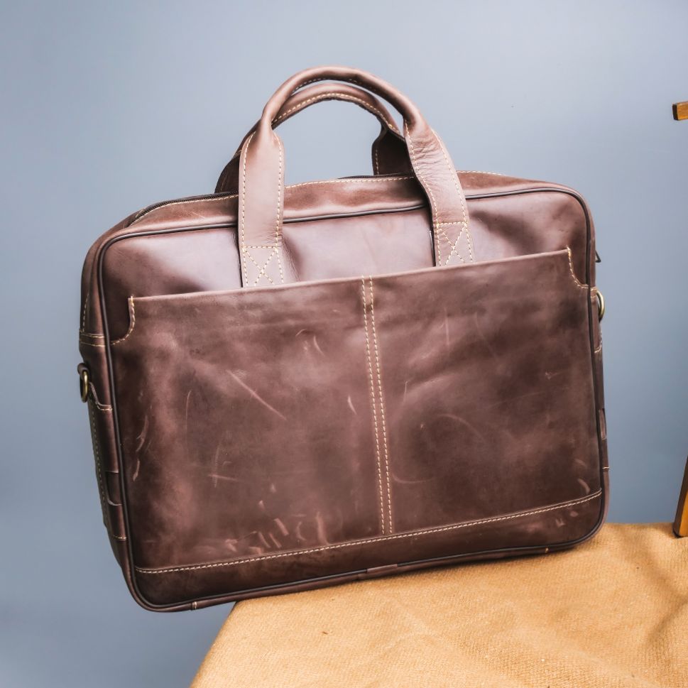 Oxford Pure Leather Vintage Business Laptop Bag in dark brown, showcasing its elegant design and multiple compartments.