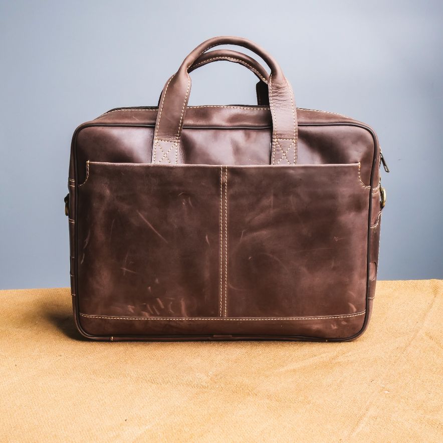 Oxford Pure Leather Vintage Business Laptop Bag in dark brown, showcasing its elegant design and multiple compartments.