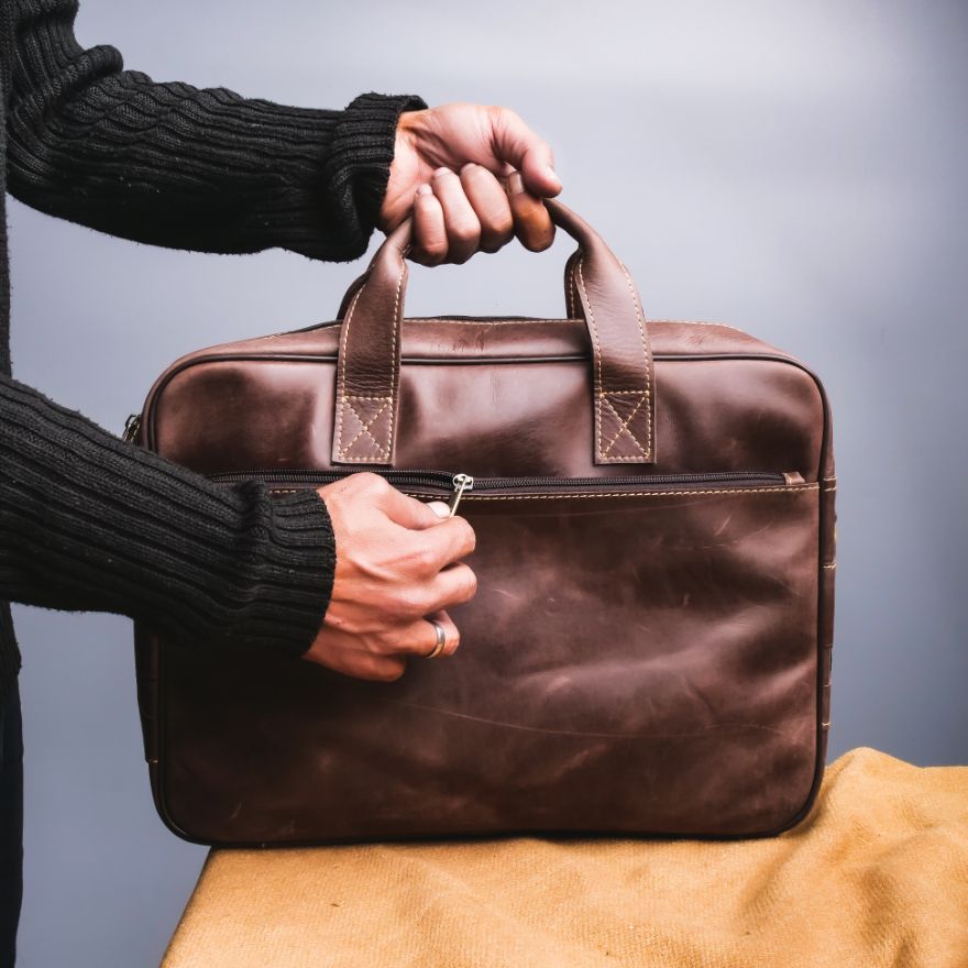 Oxford Pure Leather Vintage Business Laptop Bag in dark brown, showcasing its elegant design and multiple compartments.