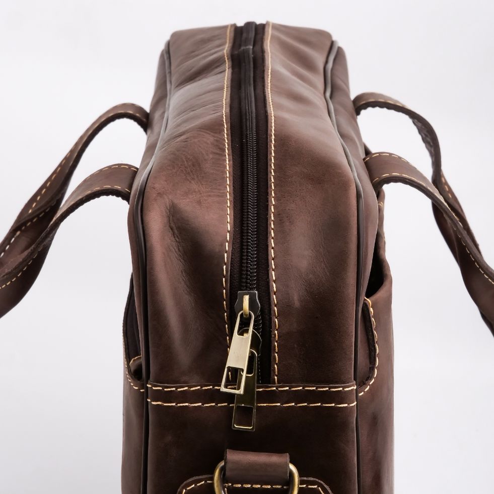 Oxford Pure Leather Vintage Business Laptop Bag in dark brown, showcasing its elegant design and multiple compartments.