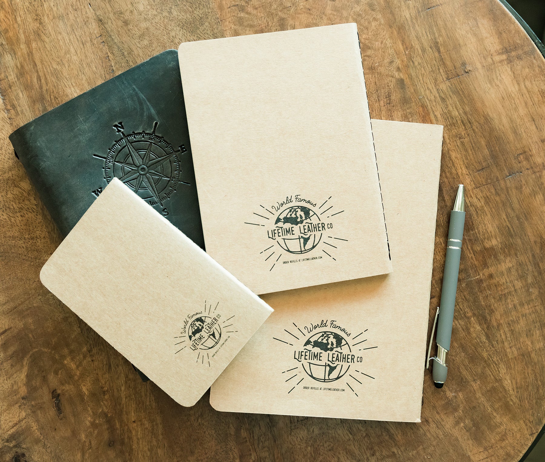 High-quality kraft paper journal refills in lined and blank styles, designed for leather journals, showcasing their durable spine stitching.