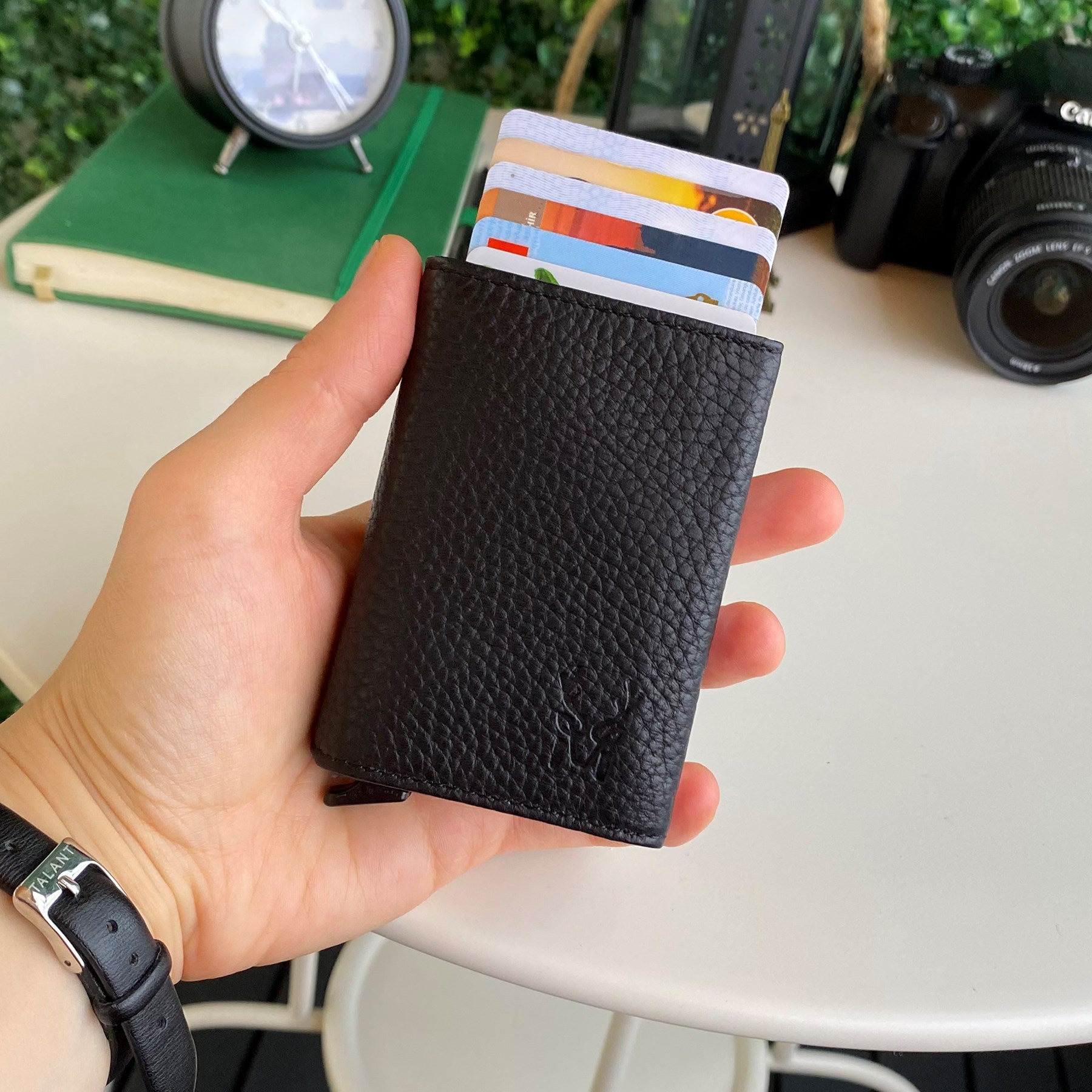 Papola Genuine Leather Pop-Up Mechanism Minimalist Card Holder in sleek design, showcasing its compartments and pop-up feature.