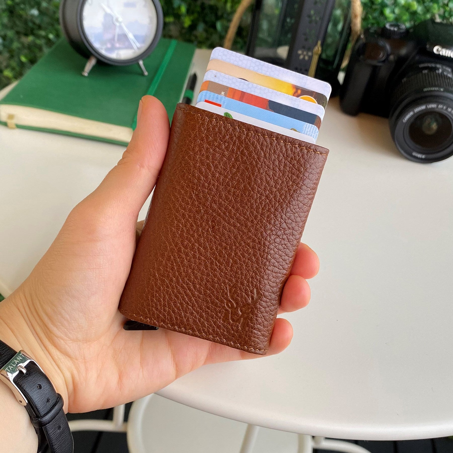 Papola Genuine Leather Pop-Up Mechanism Minimalist Card Holder in sleek design, showcasing its compartments and pop-up feature.