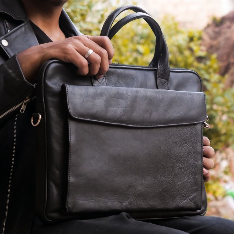 Parker Slim Leather Laptop Bag in black, showcasing its sleek design and genuine cow leather material.