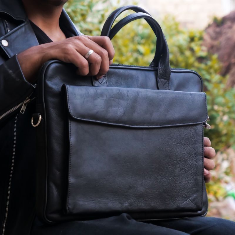 Parker Slim Leather Laptop Bag in black, showcasing its sleek design and genuine cow leather material.