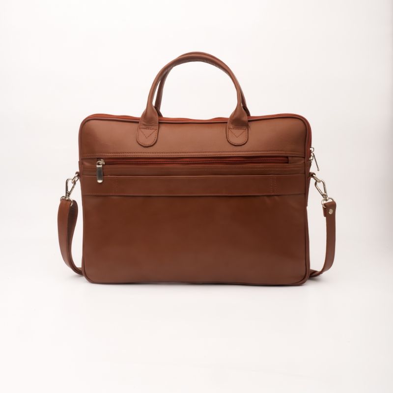 Parker Slim Leather Laptop Bag in Tan, showcasing its sleek design, adjustable shoulder strap, and multiple compartments for organization.