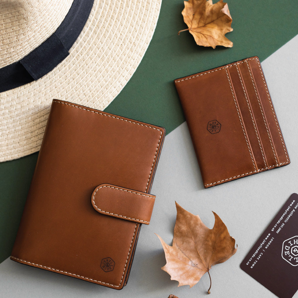 Clay Passport Leather Wallet & Organiser with RFID protection, featuring compartments for passports and boarding cards.