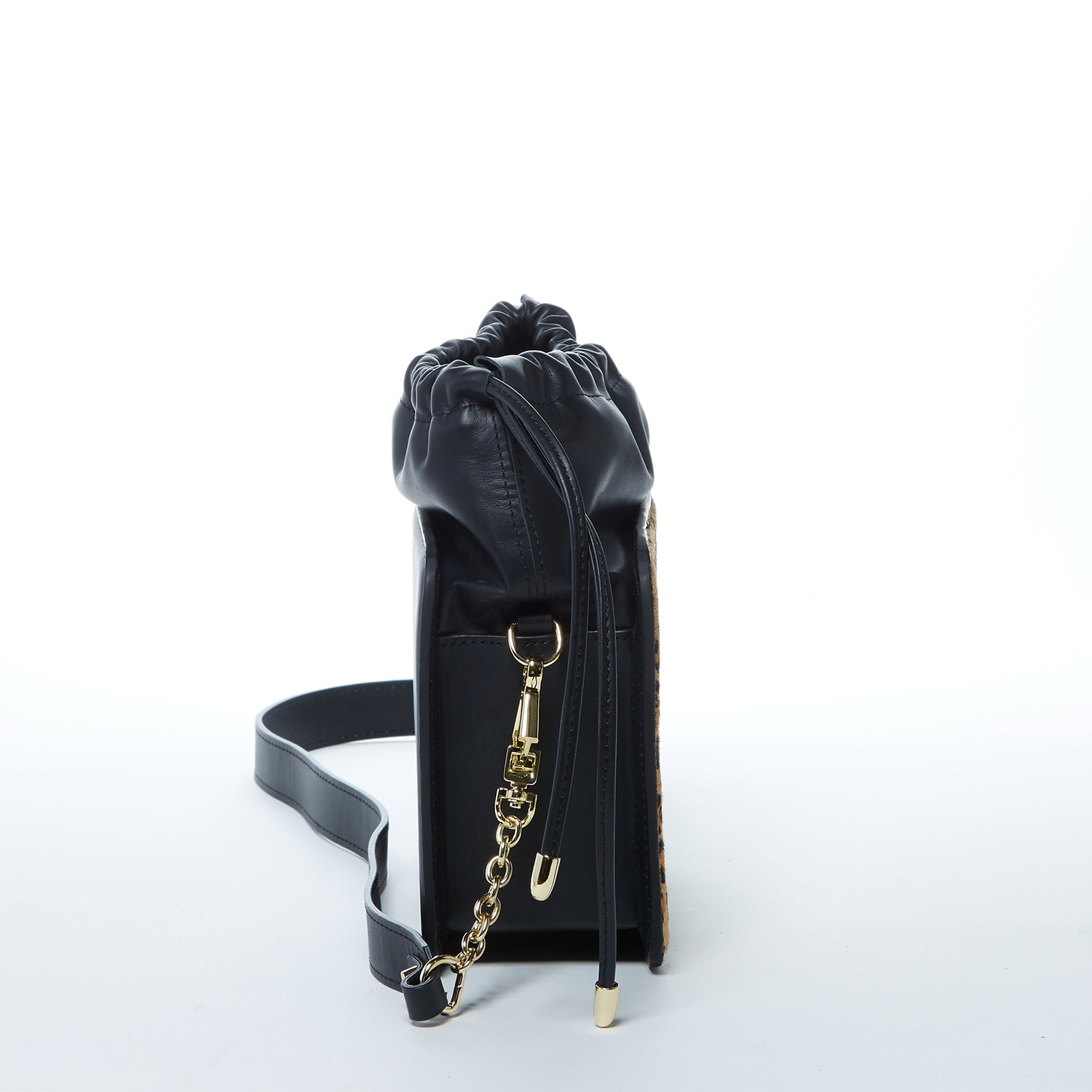 Patricia Black Leopard Leather Purse featuring a structured design with leopard print accents and gold hardware.