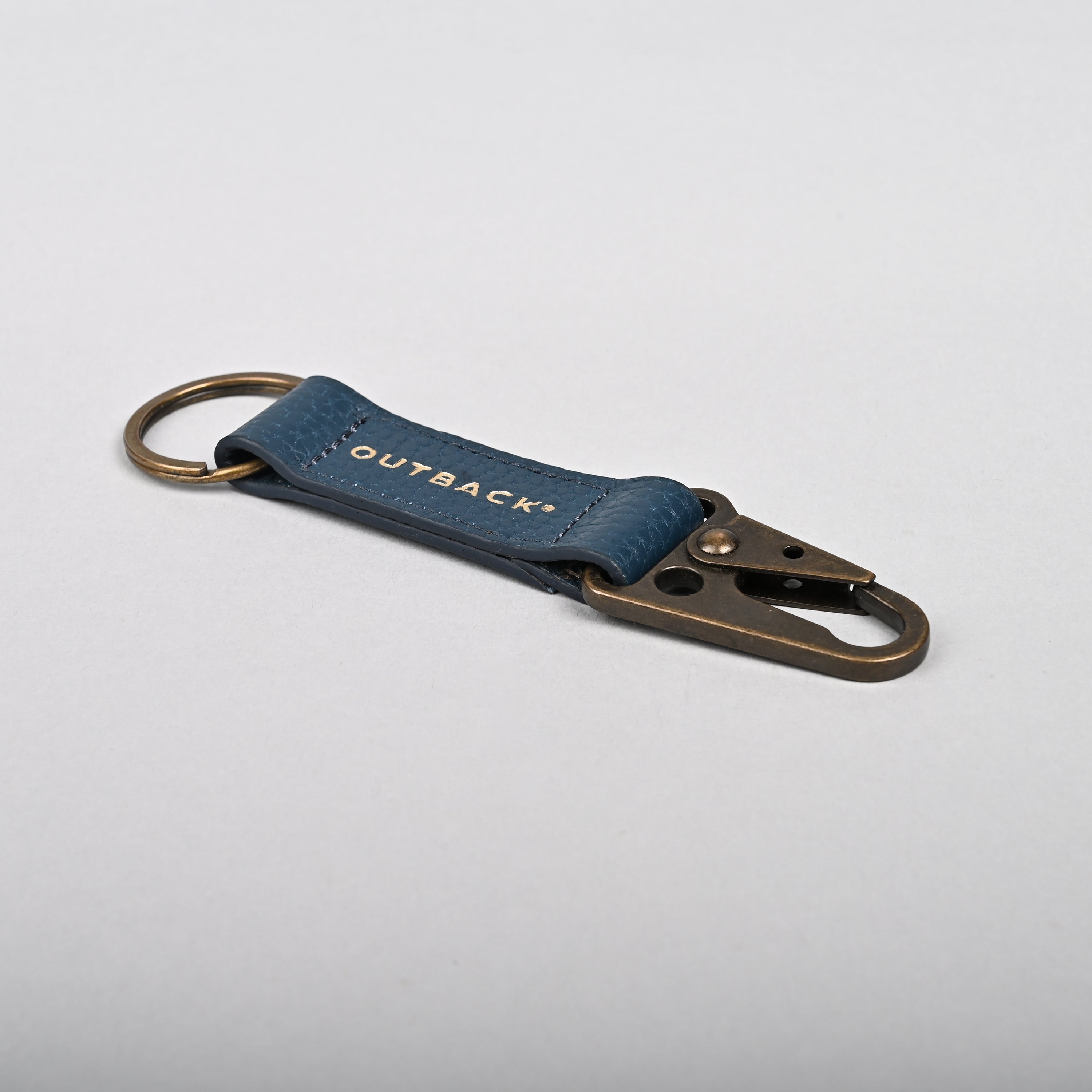 Performance Key Holder made from premium full grain leather with antique brass hardware, featuring a snap hook mechanism.