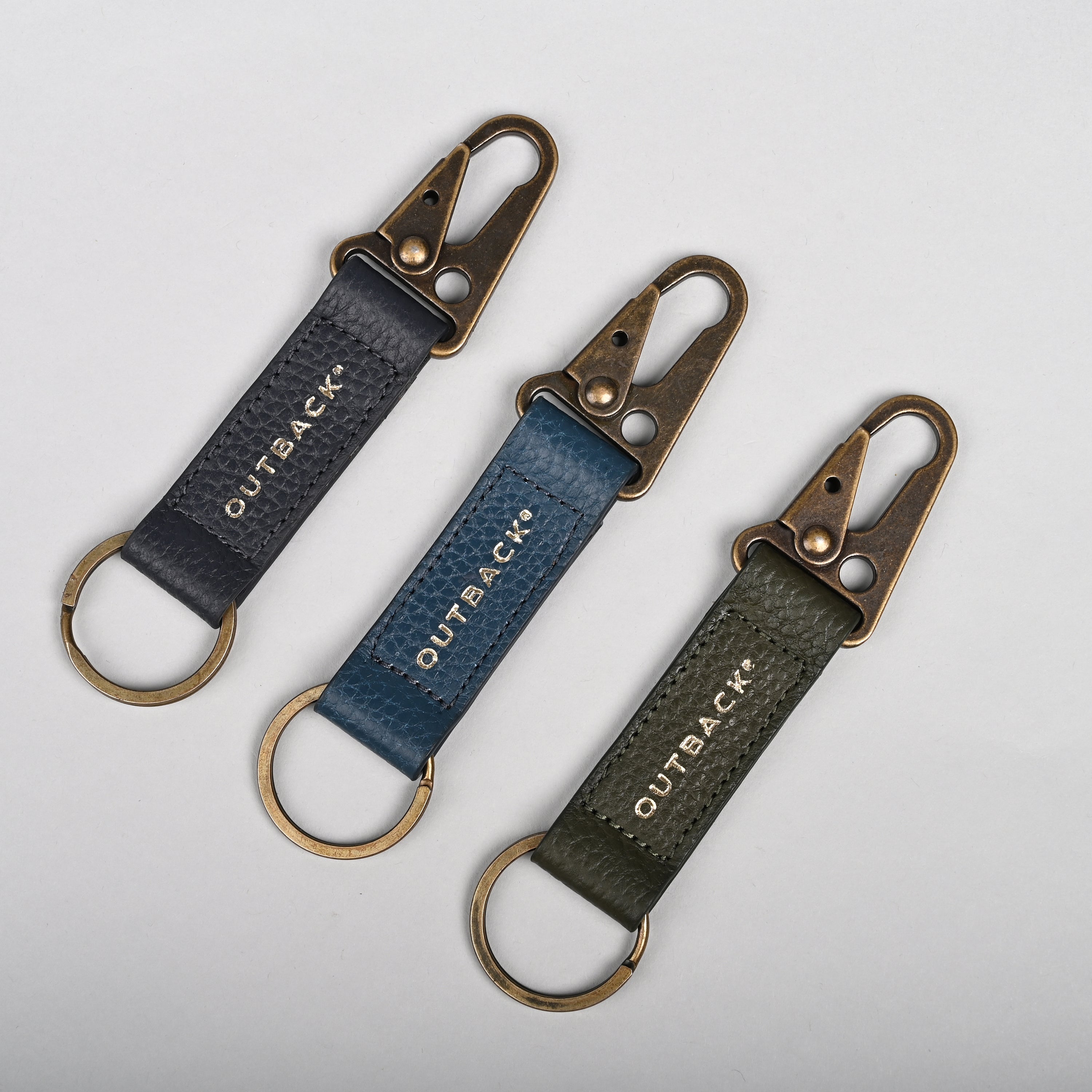 Performance Key Holder made from premium full grain leather with antique brass hardware, featuring a snap hook mechanism.