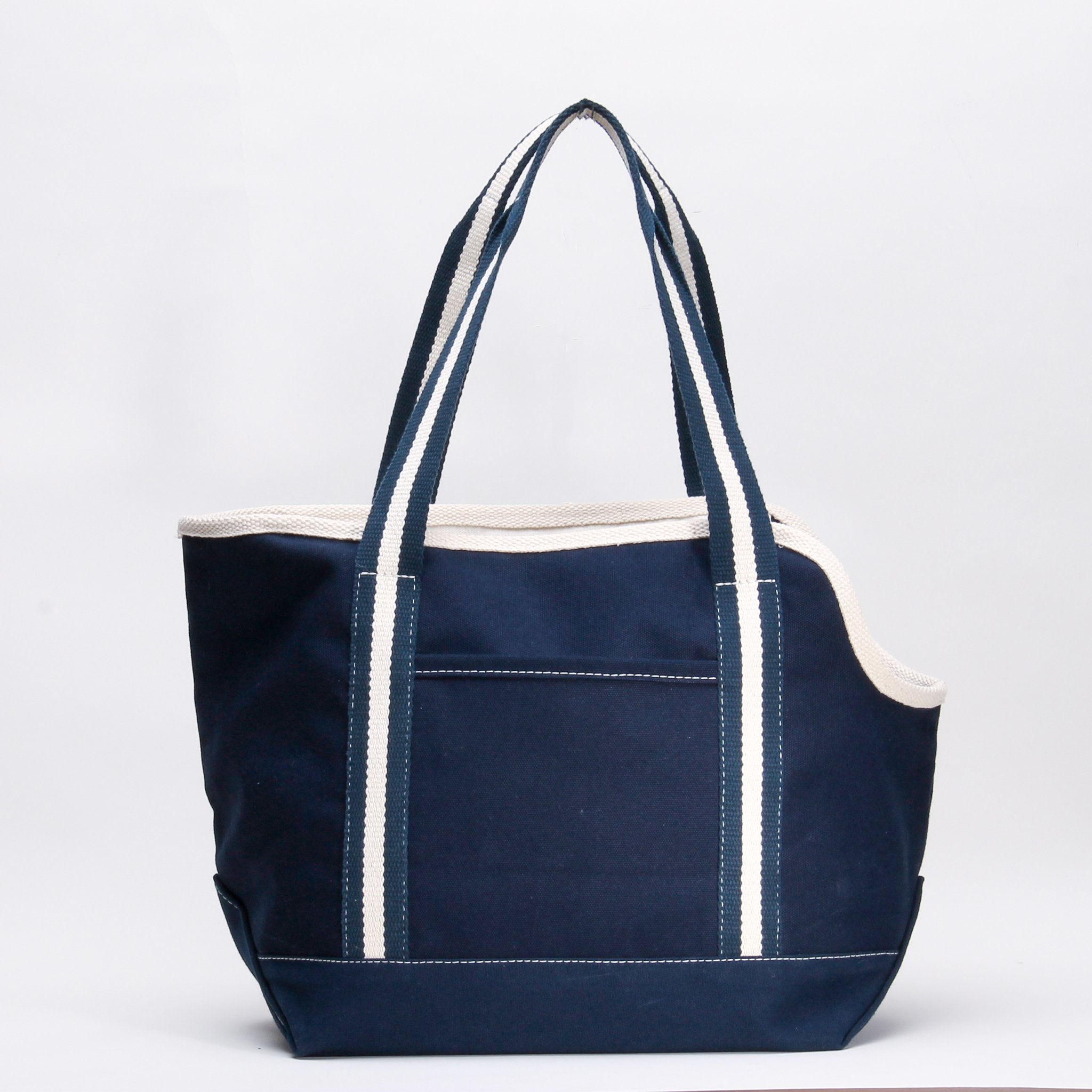 A spacious and stylish Pet Carrier Tote Bag made of heavyweight cotton canvas, featuring a zippered top, peek-a-boo opening, and an outside pocket.