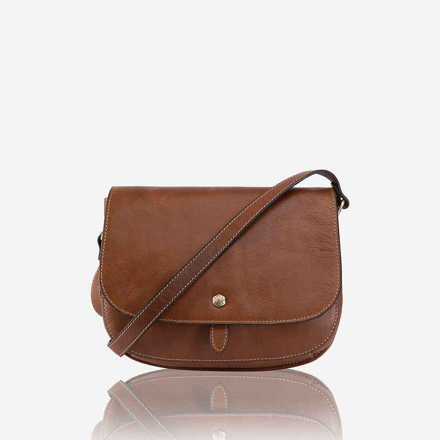 Petite Ladies Crossover Handbag in Colt color with elegant stitching and rounded design.